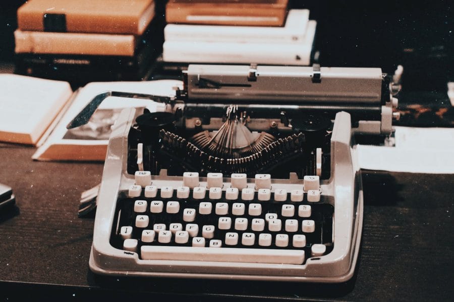 Roles in Game Development - photograph of a vintage typewriter on table